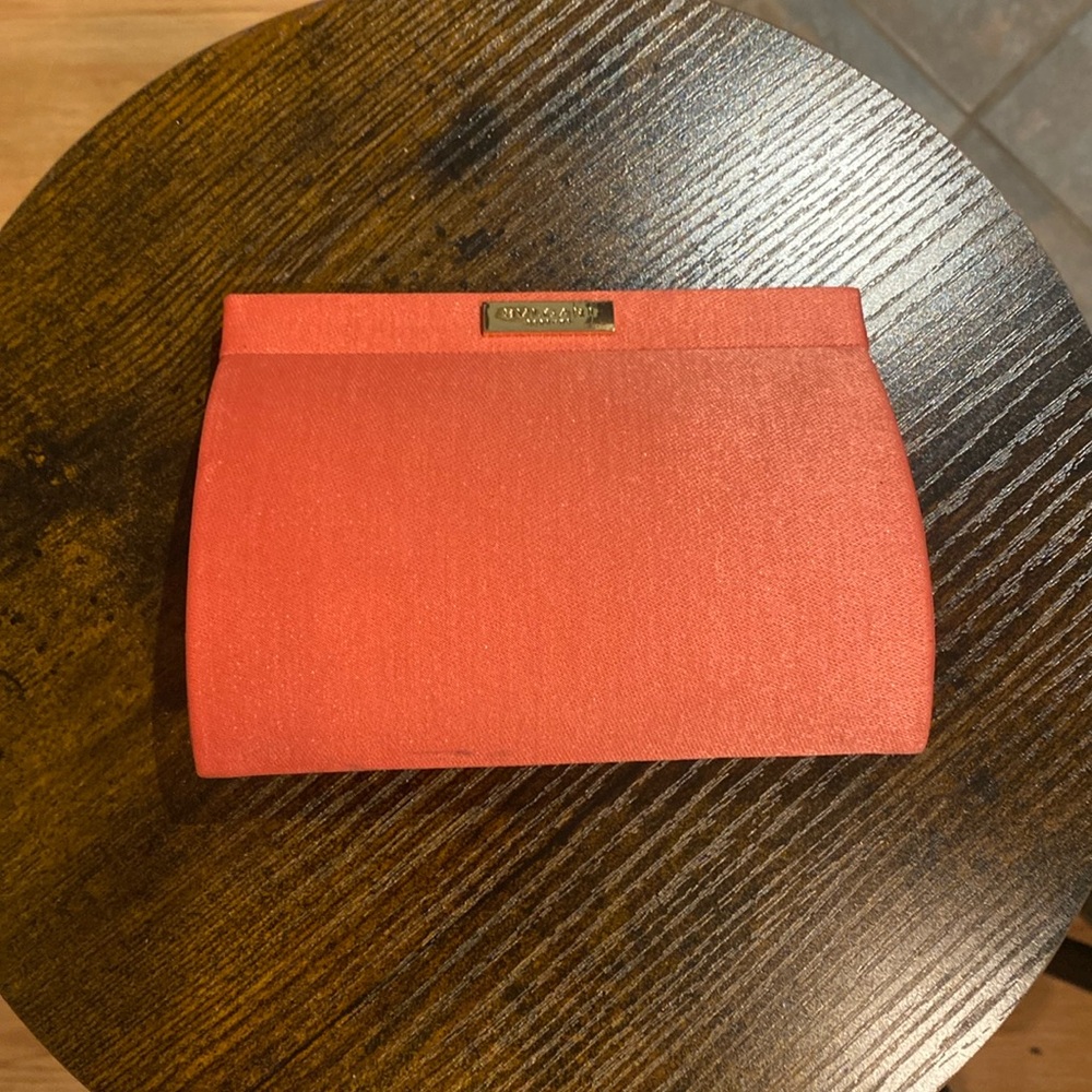 BVLGARI pink clutch barely used, but some black marks on bottom